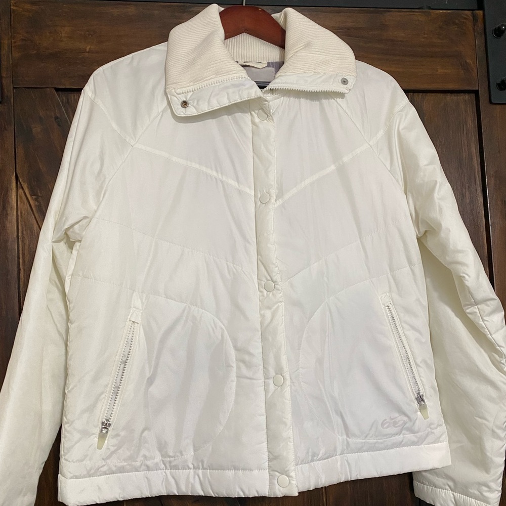 Nike light weight, zipper with snaps ivory jacket.